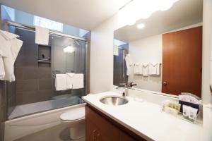 a bathroom with a sink and a toilet at Lodge Condo 004 in Black Butte Ranch +8 photos