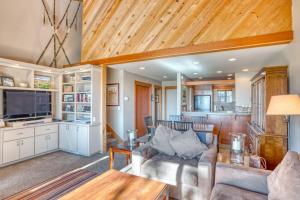 a living room with a couch and a table at Lodge Condo 022 in Black Butte Ranch