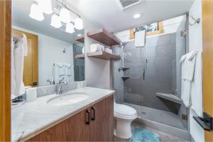 a bathroom with a sink and a shower and a toilet at Lodge Condo 036 in Black Butte Ranch