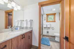a bathroom with a sink and a toilet at Lodge Room 035 in Black Butte Ranch