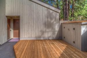 an empty garage with a wooden floor at Lodge Room 018 in Black Butte Ranch