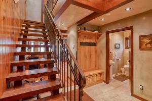 a staircase in a house with a bathroom at Country House 045 in Black Butte Ranch +12 photos