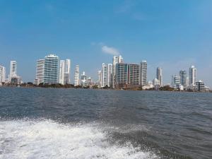 a view of a city from a boat in the water at Paraiso Playa in Cartagena de Indias