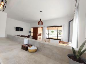 a living room with a couch and a table at Algarrobos in Cafayate