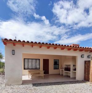 a view of the back of a house at Algarrobos in Cafayate