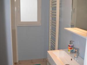 a bathroom with a sink and a window at Gîte charmant à 30 min d'Amboise - FR-1-381-145 in Saint-Nicolas-des-Motets