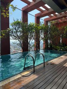 a hot tub on the roof of a building at The Reforma 27 Grand in Mexico City