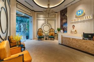 a lobby of a hotel with a hair salon at HALO HANOI HOTEL in Hanoi