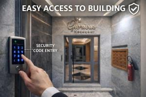 a person holding a cell phone in front of a building at Affordable Luxury Apartment in Nouaseur