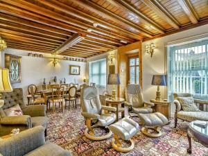 a living room with furniture and a dining room at Steppe Haugh in Hawes