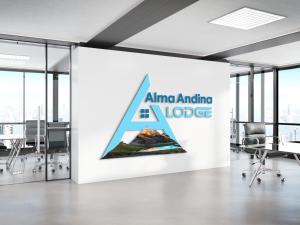 an office with a wall with an alina amd lodge sign at Alma Andina Lodge in Huaraz