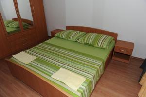 Postel nebo postele na pokoji v ubytování Apartment Matini Dvori