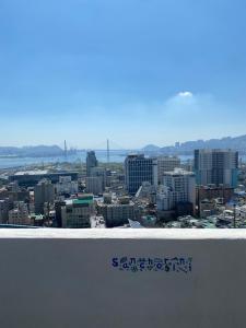 a view of a city from the top of a building at 산초리니 Sanchorini in Busan