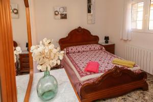 Posteľ alebo postele v izbe v ubytovaní En casa de Carlos