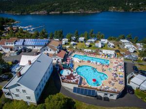 an aerial view of a resort with a swimming pool at 4 person holiday home in Risør in Risør