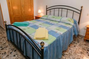 Posteľ alebo postele v izbe v ubytovaní En casa de Carlos