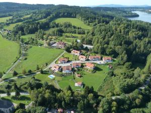 an aerial view of a large estate with houses and trees at Lipno Lake House in Přední Výtoň