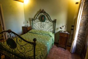 A bed or beds in a room at Il Nido - Private villa with pool and jacuzzi