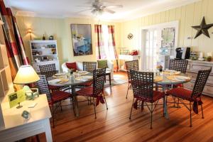 a dining room with a table and chairs at The Homestead B&B in Rehoboth Beach