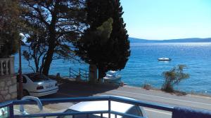 a view of the water from a balcony of a house at Apartment Sunce in Crikvenica
