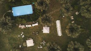 an overhead view of a yard with a pool at Villa Il Paradisino in Sesto Fiorentino