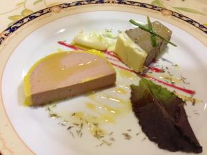 a white plate topped with different types of desserts at Pensión Ana Pilar in Porcuna