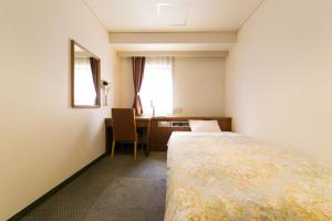 Postel nebo postele na pokoji v ubytování Hotel Ohedo