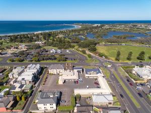 an aerial view of a town with the ocean at Best Western Olde Maritime Motor Inn in Warrnambool