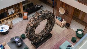 an overhead view of a living room with a large sculpture at Ambiance Resort Hunza in Hunza Valley