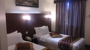 A room at Hotel & Apartment Ambassador 3