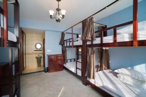 Postel nebo postele na pokoji v ubytování Memory Inn Guilin Central