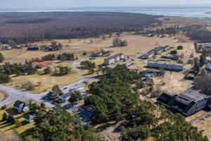 an aerial view of a building in a field at Emmaste Apartment in Emmaste