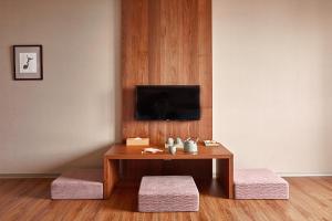 Televisyen dan/atau pusat hiburan di Orange Hotel - Wenhua, Chiayi