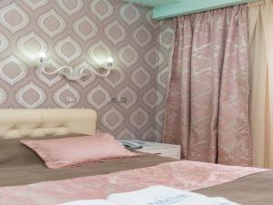 Кровать или кровати в номере Maranton Beach Hotel