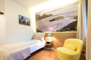 Postel nebo postele na pokoji v ubytování Senja Hotell