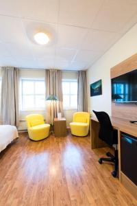 TV a/nebo společenská místnost v ubytování Senja Hotell
