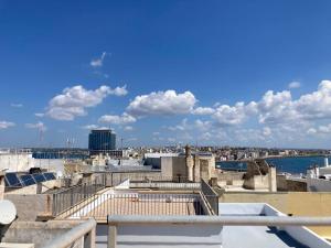 a view of the city from the roof of a building at Palazzo Gallo Resort in Gallipoli