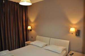 Säng eller sängar i ett rum på Black Sea Brееze Apartment