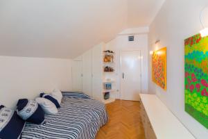 Postel nebo postele na pokoji v ubytování Apartment Hedera A14