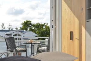 Rõdu või terrass majutusasutuses Ferienwohnung Oberdeck