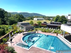 an overhead view of a swimming pool on top of a building at Hotel Zum Schwarzen Walfisch in Bad Säckingen