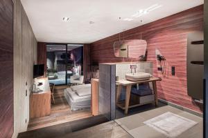 A kitchen or kitchenette at Senses Violett Suites - Adults Only