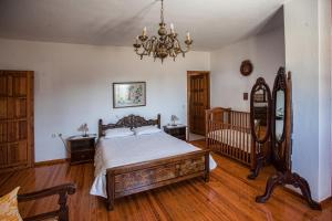 A bed or beds in a room at Petrinos Milos
