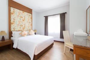 Postel nebo postele na pokoji v ubytování Alisea Pool Villa Aonang