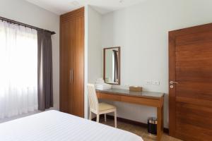 Postel nebo postele na pokoji v ubytování Alisea Pool Villa Aonang