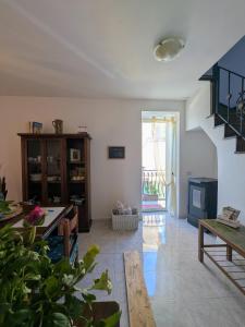 a living room with a pool table and stairs at DaLu' tourist accommodation in Vallerano