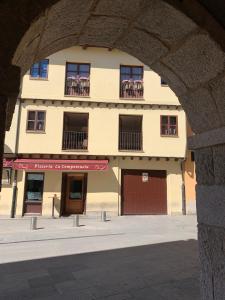 a building with balconies on the side of it at El Balcón de la Encina in Ponferrada