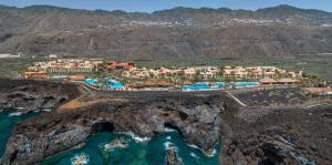 an aerial view of a resort on the edge of a mountain at La Palma Princess in Fuencaliente de la Palma