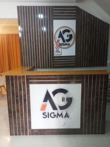 a sign for a sinema on a wall at AG Sigma Apartments in Port Harcourt
