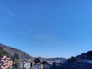 a view of the city of positano from the hill at Elizabeth House in Como
